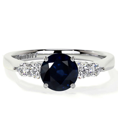 Sophisticated Blue Sapphire and Diamond Five Stone Ring: 